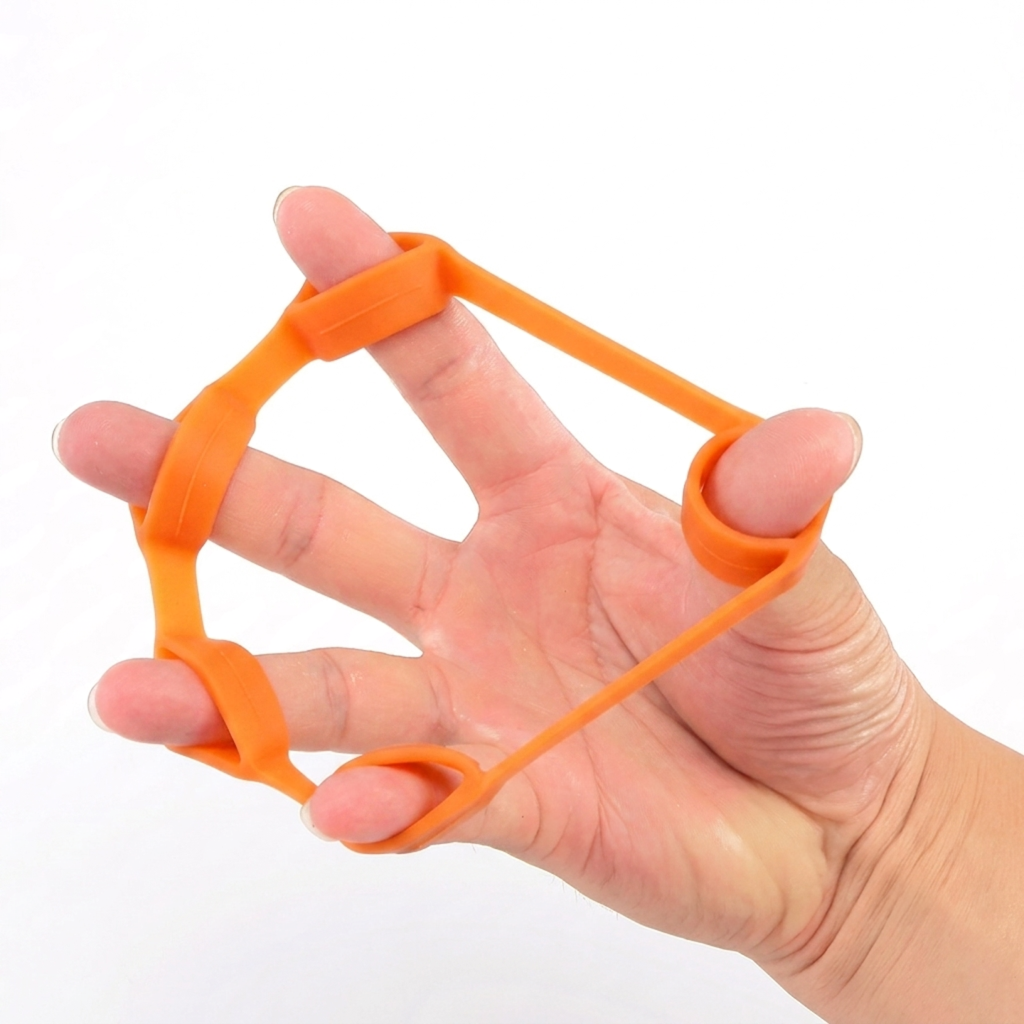 X Extender ORANGE finger extensor trainer in use.
